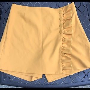 TORY BURCH SPORT- mustard ruffle skort NWOT